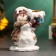 Snowman Snowman with a gift 12cm