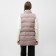 Warmed female vest, beige color, size 44