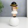 Polystone souvenir "Baby in a black hat, with a gold bubble on the ball" 15x7x7 cm
