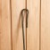 Metal golden poker, length 66 cm