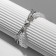 Bracelet Pearl "Castle" ball No. 8, white-gray color in silver, l = 16 cm