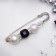 Pin "Cube" 6.5 cm, white-black color in silver