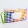 Container for napkins with a loop "circles"