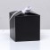 The box is folding, square, black, 8 x 8 x 8 cm,