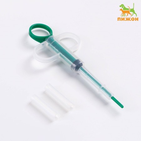 A universal set for dosing drugs and food, with silicone nozzles, green