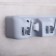 Holder for harvesting inventory with hooks of a share, 26 × 6 × 10 cm, color gray color