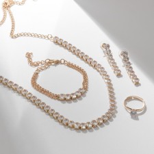 Set 4 objects: earrings, necklaces, bracelet, ovala ovals ring, white color in gold