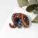Etnik's brooch "Elephant", colored in black gold