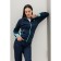 Female sports suit, size 50, dark blue color, turquoise