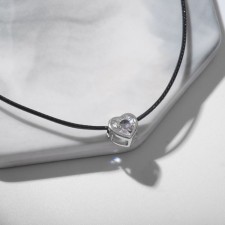 Piece on the Black Night cord in framing, white color in silver on a black lace, 35 cm