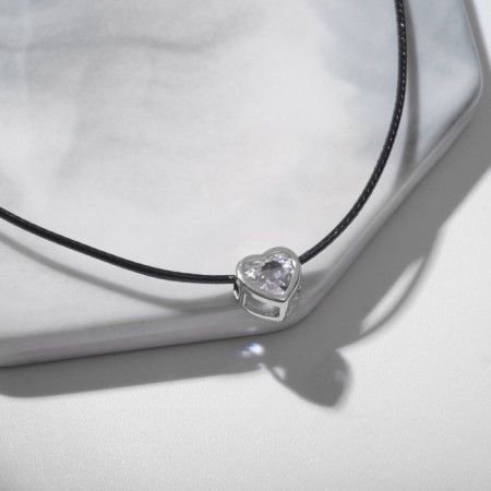 Piece on the Black Night cord in framing, white color in silver on a black lace, 35 cm