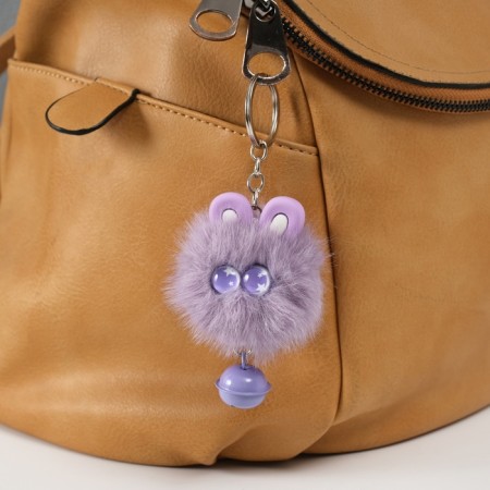 Fluffy on the ring "Star eyes with a bell" purple 8.5x6x6 cm