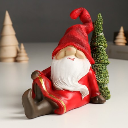 Souvenir Polystone Light "Santa Claus in a red outfit sits at the Christmas tree" 14x7x18 cm-1