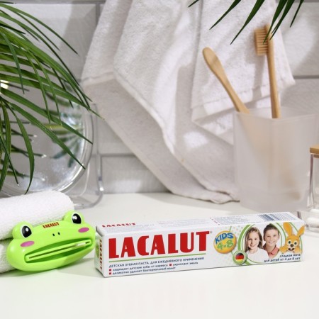 Promotion, children's toothpaste Lacalut Kids 4-8, 50 ml+squeezer for toothpaste.-1