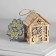 Christmas tree toy "House with a snowman", from batteries, a glow of warm white
