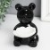 Souvenir ceramics stand "Bear with white flower" black 7x9x10.5 cm