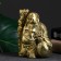 Figure "God Hotya No. 1 with a bag and staff" gold, 16x14x10cm