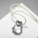 The pendant "Ice Heart" on the threads, a Christmas tree, white color in silver on a beige lace, 30 cm