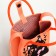 Bag on the "Choose" button, Orange color