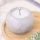 Candle "Shar" in the candlestick of gypsum is smooth, 9.5x6.5cm, marble with black stripes