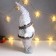 Interior doll "Santa Claus in a white-pearl cap and a vest with sequins" 55x16x22 cm 62601