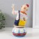Souvenir Ceramics musical "Clown with butterfly and flower, sits on a cup" 9.5x10x18 cm