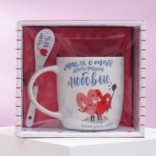 Ceramic mug with a spoon 