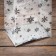 A package with a hard bottom of 11 x 17 x 55 Silver "snowflakes"