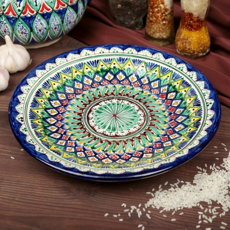 Plate of the Rishtan ceramics "Flowers", 27 cm, blue