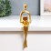 Polystone souvenir "Girl with the book" Gold 23x6.8x9.6 cm
