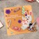 Brooch "Rabbit" Rush cheeks, white-orange color in gray metal