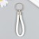 Keychain metal to the leatherette "strap" white 10x4 cm