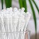 Cosmetic cotton wools with a spiral wagon of 100 pcs in a glass