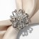 Ring for the scarf "flower" voluminous with rhinestones, white color in silver