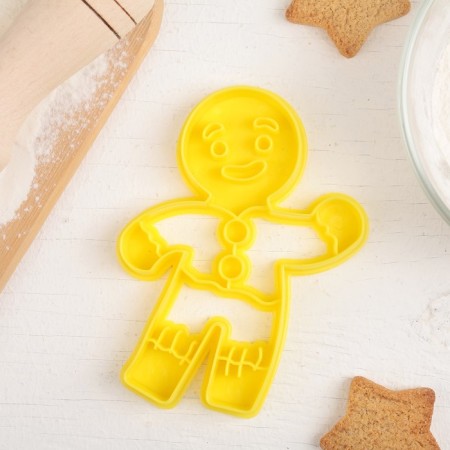 Bed -up form "gingerbread man", cutting, stamp, 11.5 × 8 cm, yellow color