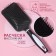The comb is massage, wide, 8 × 25 cm, black/white color