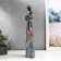 Polystone souvenir "African with a baby in an outfit under the zebra" 43.5x8x11.5 cm