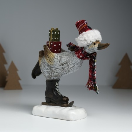 Polystone souvenir "Goose in a cap, knitted scarf, on mini-covers, with gifts" 6.5x19.5x17 cm 10325-2