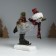 Polystone souvenir "Goose in a cap, knitted scarf, on mini-covers, with gifts" 6.5x19.5x17 cm 10325