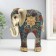 Polystone souvenir "Elephant, blue-red snowflakes" 14x6x16.5 cm
