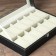 The casket to the leatherette to the clock 12 "Black with a white line" 30x20x8.2 cm