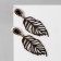 Clips "feathers" solo, black color in black gold
