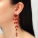 Hanging earrings with rhinestones "bun" deciduous, red color in gold, 9.5 cm