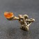 A purse souvenir "Mouse with a full spoon", with natural amber