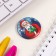 New Year of the setting icon d = 35 mm "Santa Claus with a gift" 6.5x6.5 cm