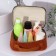 Cosmetic bag with a lining, brown color