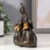 Polystone souvenir "Two African brown elephants" Golden ears 13.5x5x9.5 cm