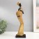 Polystone souvenir "African with round wicker jug" gold 33x9.5x9.5 cm