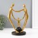 Polystone souvenir "Strength in unity" gold 12x17.5x26.5 cm
