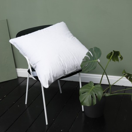 The pillow is low, size 70x70 cm, color mix